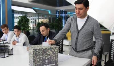 Год Нисанов: Чемодан налички, Вокзал, СИЗО